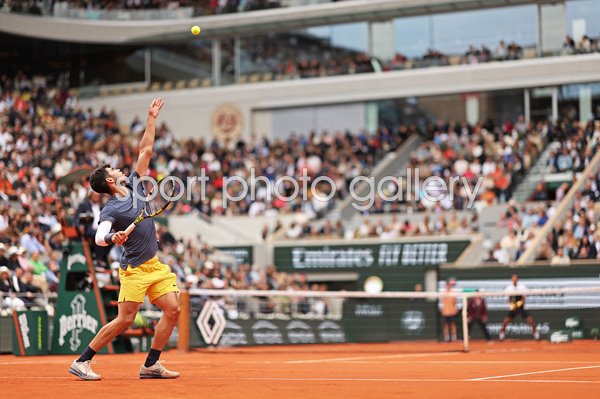 Carlos Alcaraz Spain serves v Felix Auger-Aliassime French Open Paris 2024