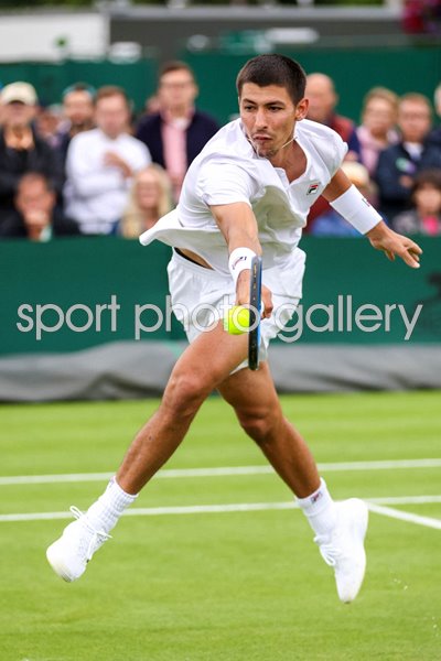 Alexei Popyrin Australia plays a backhand Wimbledon 2024