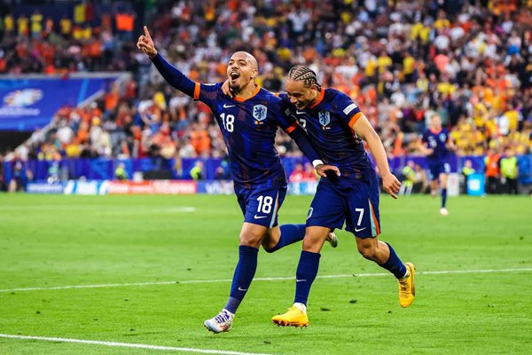 Donyell Malen & Xavi Simons Netherlands celebrate v Romania Last 16 Munich EURO 2024