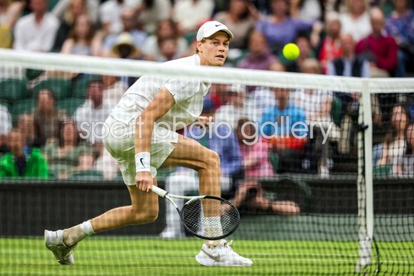 Jannik Sinner Italy backhand touch v Matteo Berrettini Wimbledon 2024