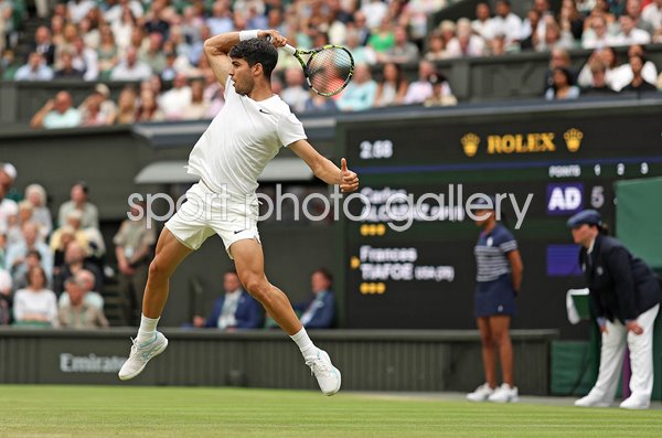 Carlos Alcaraz Spain forehand v Frances Tiafoe USA Wimbledon 2024