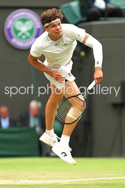 Ben Shelton USA serves v Denis Shapovalov Canada Wimbledon 2024