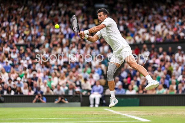 Novak Djokovic Serbia backhand v Holger Rune Denmark Wimbledon 2024