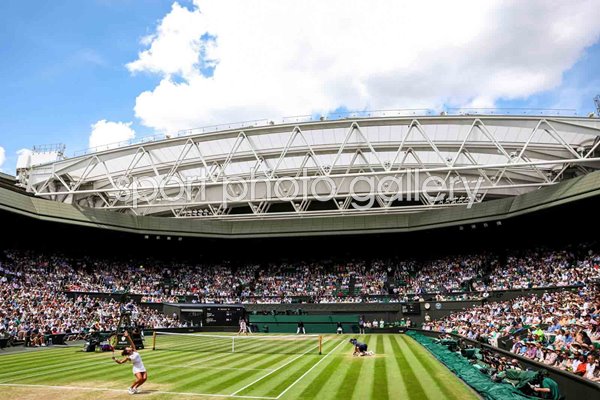 Jasmine Paolini Italy serves v Donna Vekic Semi Final Centre Court Wimbledon 2024