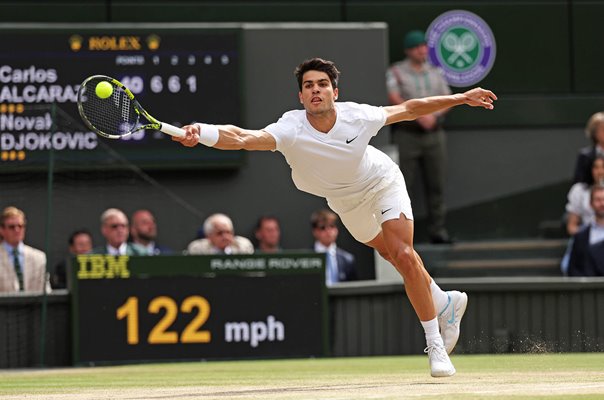 Carlos Alcaraz Spain stretch forehand v Novak Djokovic Wimbledon Final 2024