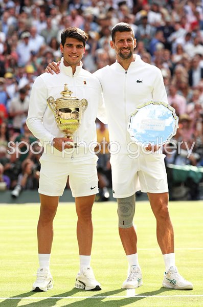 Champion Carlos Alcaraz Spain with runner up Novak Djokovic Wimbledon 2024
