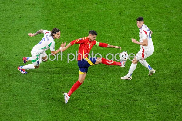 Alvaro Morata Spain controls the ball v Riccardo Calafiori Italy EURO 2024