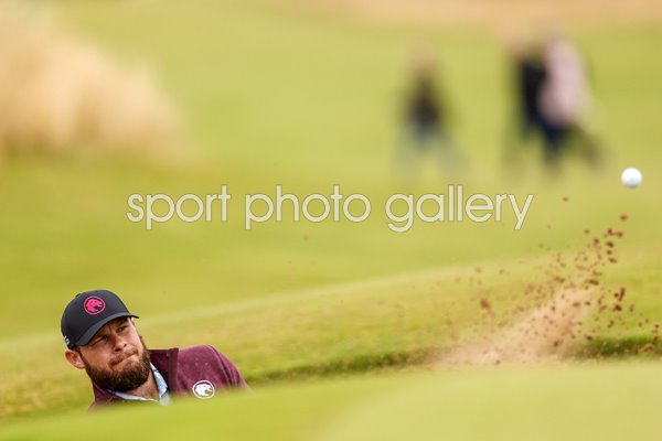 Tyrrell Hatton England plays a bunker shot Day 1 British Open Royal Troon 2024