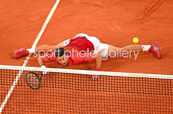 Novak Djokovic Serbia sliding forehand v Francisco Cerundolo French Open Paris 2024