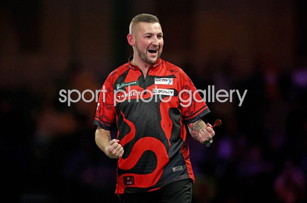 Nathan Aspinall England celebrates v Luke Littler World Darts Championships 2025