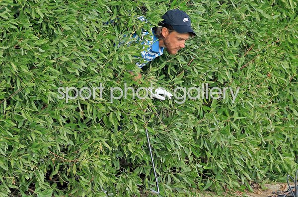Tommy Fleetwood England in the bushes Dubai Desert Classic Emirates Club 2025