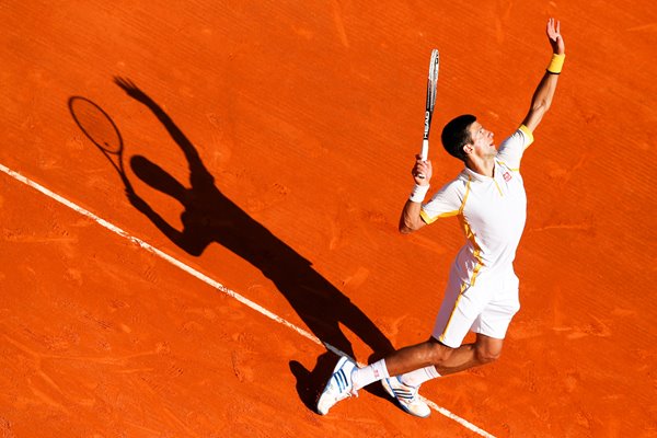 Novak Djokovic serve silhouette Monte Carlo 2013