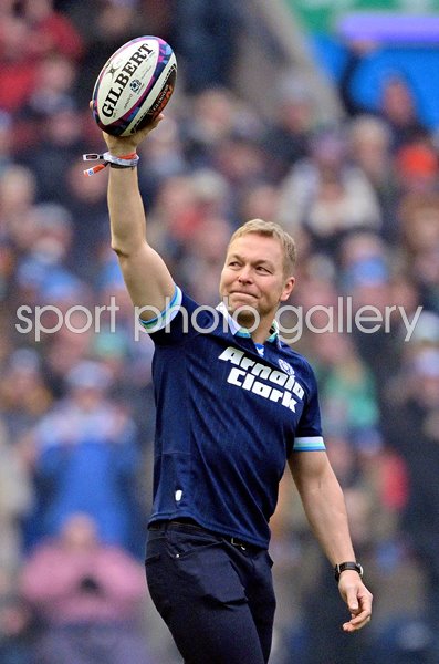 Sir Chris Hoy holds up the match ball Scotland v Ireland Murrayfield Six Nations 2025