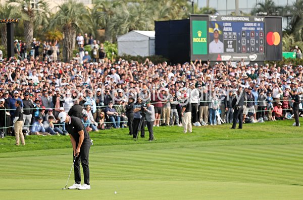 Ludvig Åberg Sweden holes out for victory 18th green Torrey Pines 2025
