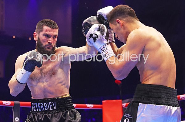 Artur Beterbiev punches Dmitrii Bivol World Light Heavyweight Rematch Riyadh 2025