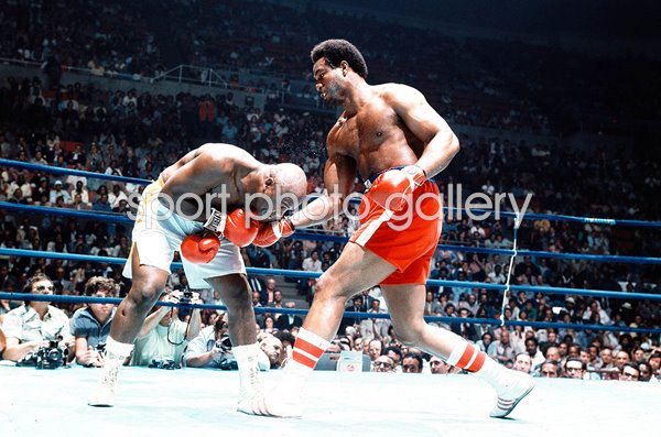 George Foreman punches Joe Frazier Heavyweight Fight New York 1976