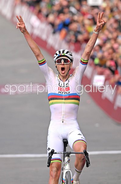 Tadej Pogacar Slovenia celebrates finish line Strade Bianche 2025