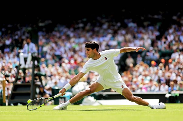 Carlos Alcaraz Spain at full stretch v Fabio Fognini Wimbledon 2025