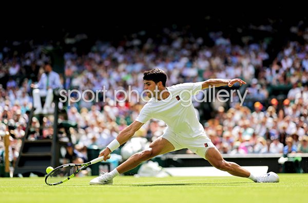 Carlos Alcaraz Spain at full stretch v Fabio Fognini Wimbledon 2025