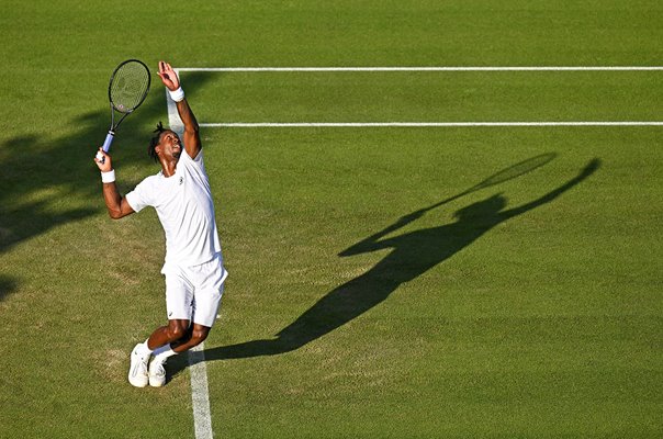 Gael Monfils France serves against Ugo Humbert Wimbledon 2025