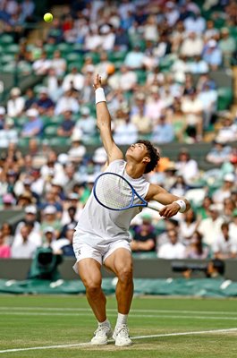 Ben Shelton USA serves v Lorenzo Sonego Centre Court Wimbledon 2025