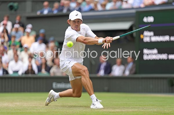 Alex De Minaur Australia plays a backhand v Novak Djokovic Wimbledon 2025