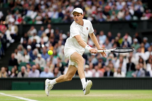 Jannik Sinner Italy plays a backhand v Grigor Dimitrov Wimbledon 2025