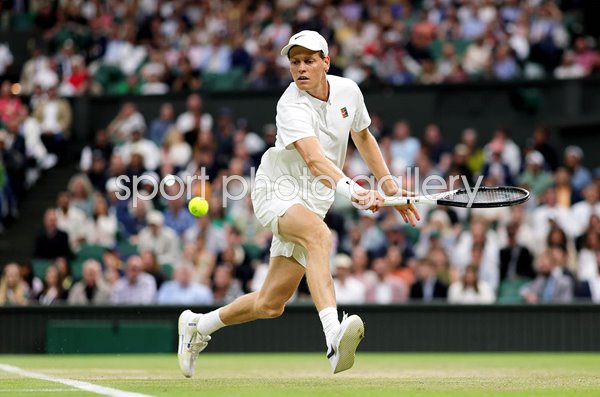 Jannik Sinner Italy plays a backhand v Grigor Dimitrov Wimbledon 2025
