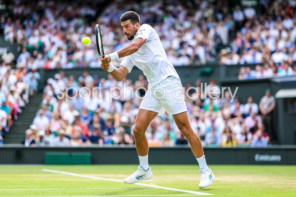 Novak Djokovic Serbia plays a backhand v Flavio Cobolli Wimbledon 2025