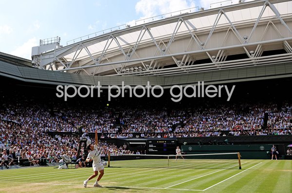 Carlos Alcaraz Spain serves v Jannik Sinner Italy Centre Court Wimbledon Final 2025