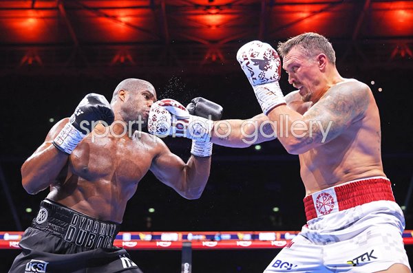 Oleksandr Usyk punches Daniel Dubois Wembley London 2025