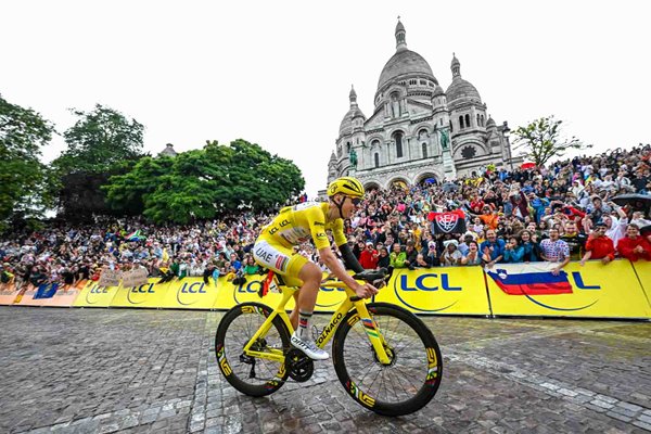 Tadej Pogacar passing the Cote de la Butte Montmatre close the Basilique du Sacre-Coeur during the 112th Tour de France 2025, Stage 21