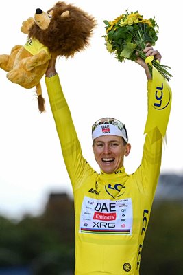 Tadej Pogacar celebrates at podium as Yellow leader jersey winner during the 112th Tour de France 2025, Stage 21