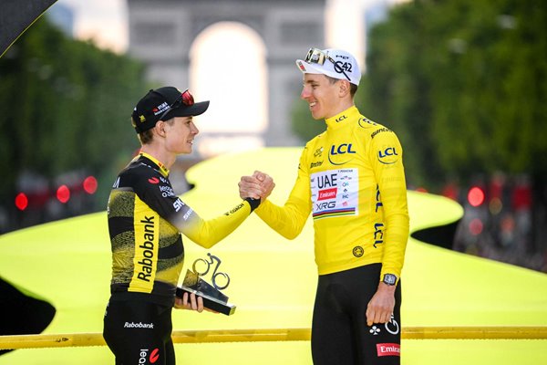 Jonas Vingegaard and final overall winner, Tadej Pogacar congratulate each other at podium during the 112th Tour de France 2025, Stage.