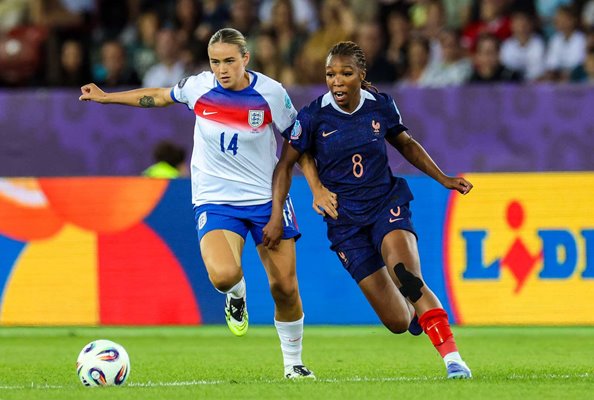 Grace Clinton battles for possession with Grace Geyoro during the UEFA Women's EURO 2025 Group D match between France and England.