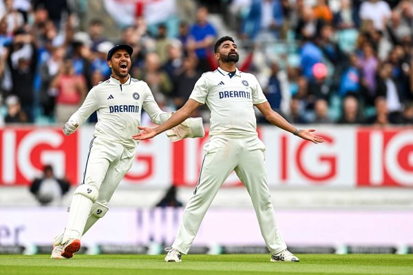 Mohammed Siraj celebrates the match winning wicket of Gus Atkinson of England with teammate Dhruv Jurel on day five of the 5th Test Match at The Oval 2025