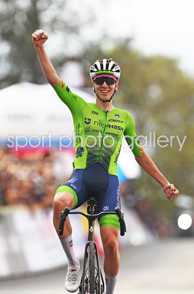 Tadej Pogacar Slovenia celebrates finish line World Road Race Kigali 2025