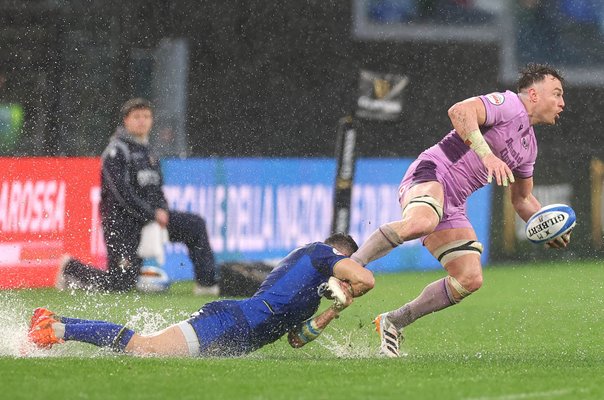 Jack Dempsey Scotland tackled by Alessandro Fusco Italy Six Nations Rome 2026
