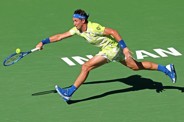 Casper Ruud Norway running forehand v Carlos Alcaraz Indian Wells 2026