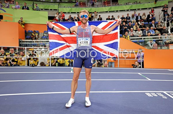 Josh Kerr Great Britain celebrates 3000m Gold World Indoor Athletics Poland 2026