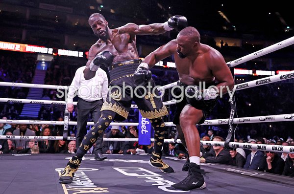 Dereck Chisora lands punch v Deontay Wilder heavyweight classic fight London 2026