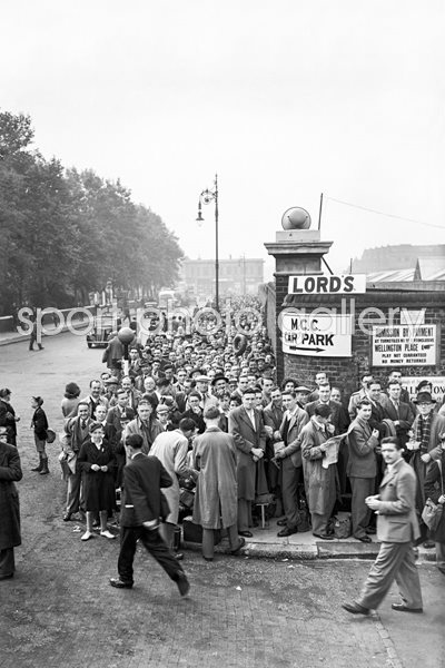 Spectators Queue At Lord's
