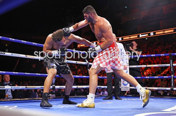 Filip Hrgovic Croatia punches Moses Itauma Heavyweight Title Fight London 2026