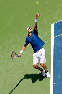 John Isner serves Western & Southern Open 2013