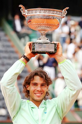Rafael Nadal with 2010 French Open trophy