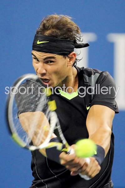 Rafael Nadal of Spain hits a return