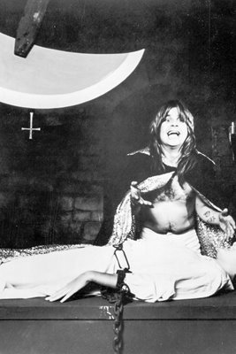 Ozzy Osbourne Tortures Woman With Swinging Blade, c. 1982.