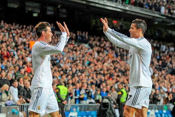 Gareth Bale celebrates with Cristiano Ronaldo