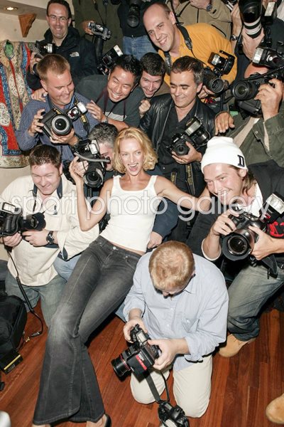 Uma Thurman with paparazzi