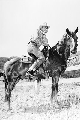 Gary Cooper on horseback